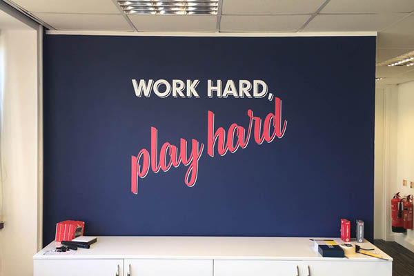 Picture showing cut vinyl on an office wall