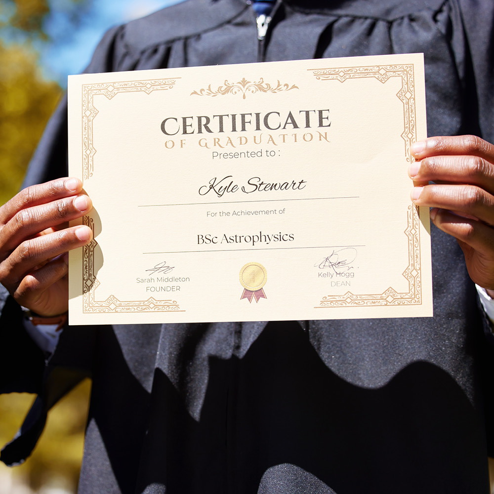 Person holding printed certificate